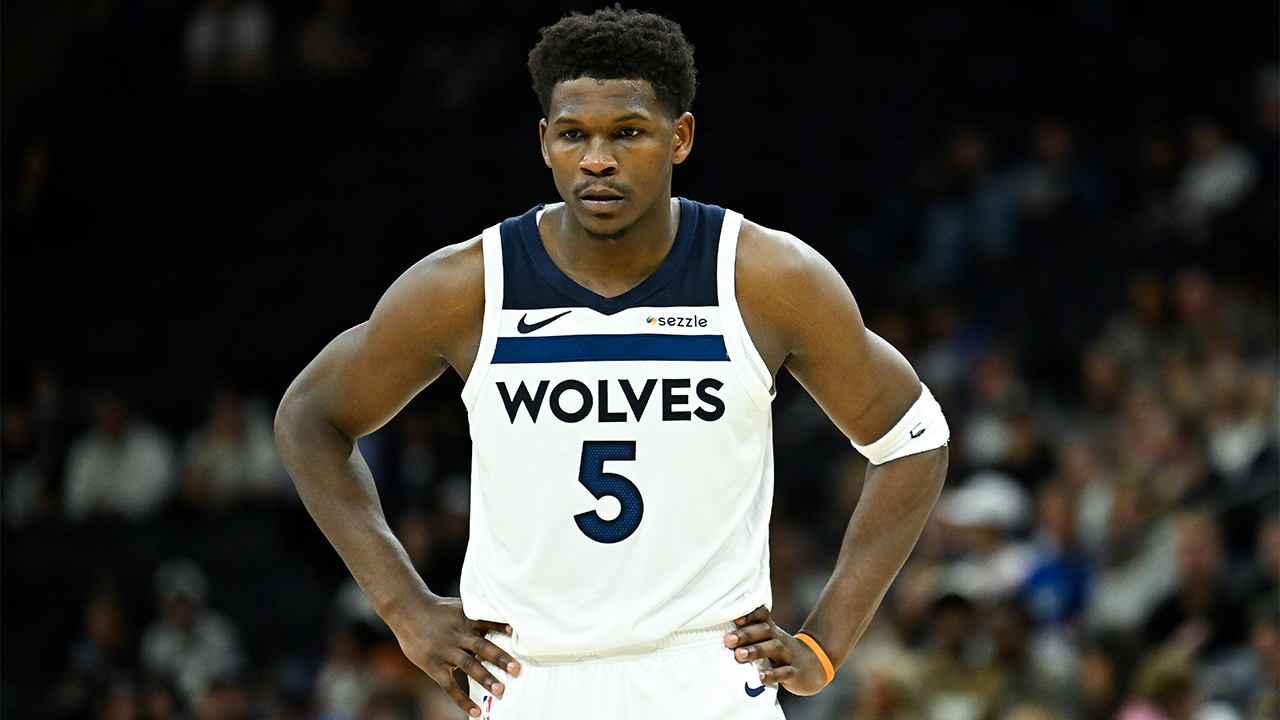 Anthony Edwards in action for the Minnesota Timberwolves, driving to the basket